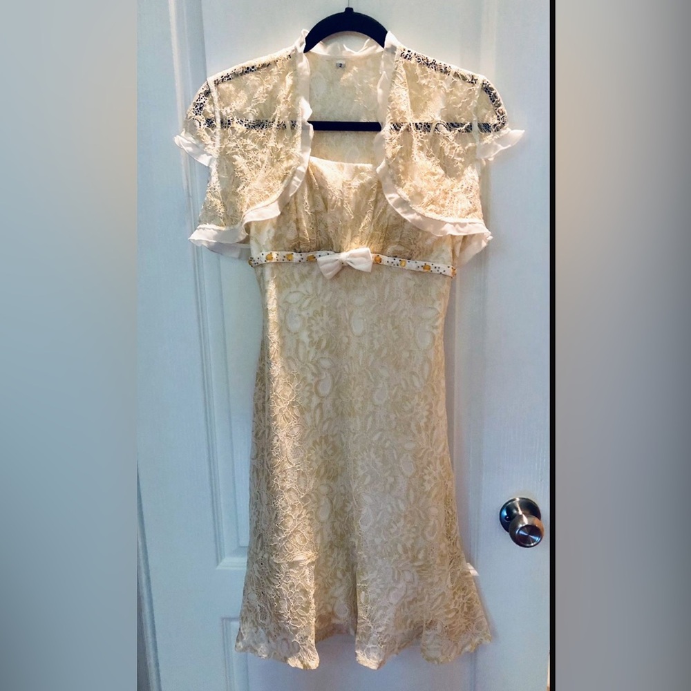 New Lace Evening Dress with a lace cope, size 2-4